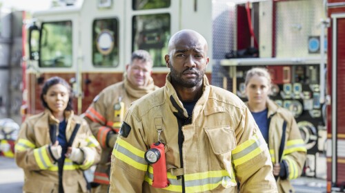 African-American firefighter and crew