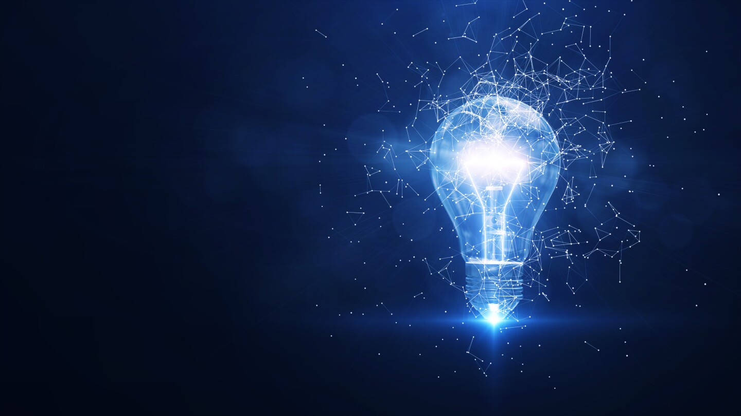 Electric light bulb bright polygonal connections on a dark blue background. Technology concept innovation artificial intelligence brainstorming business success.